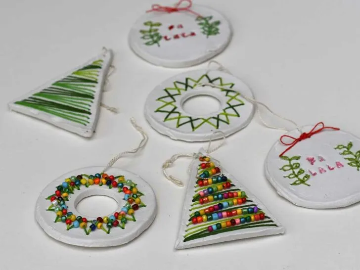 Embroidered and beaded clay Christmas ornaments, Tree, wreath and bauble.