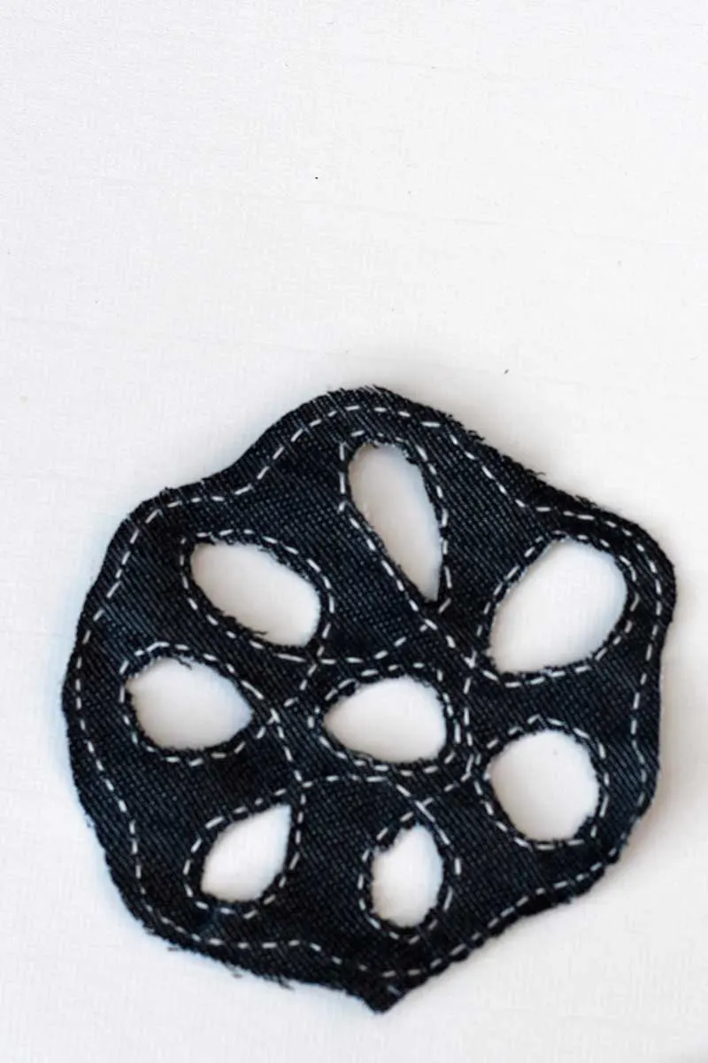 All holes cut out of Sashiko denim coasters