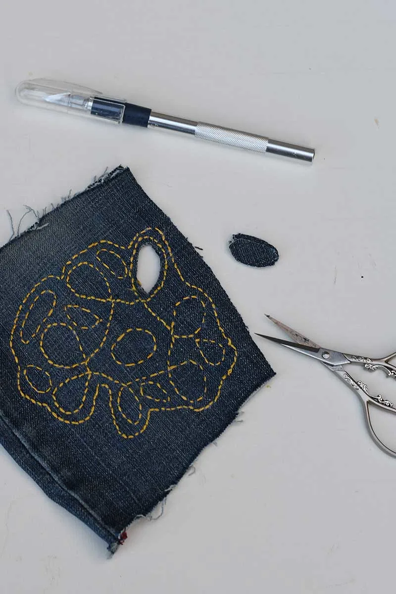 cutting holes in denim sashikko stitching for coaster