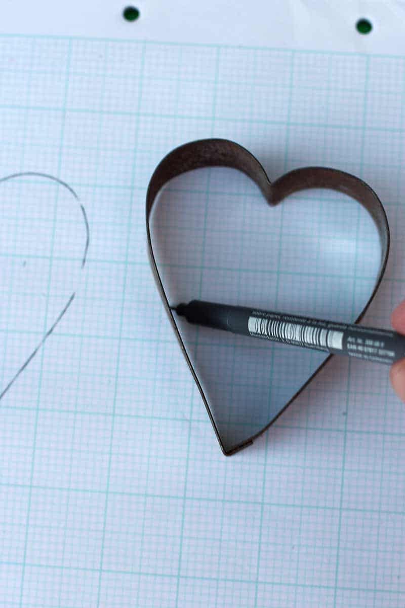 drawing a heart shape using a cookie cutter