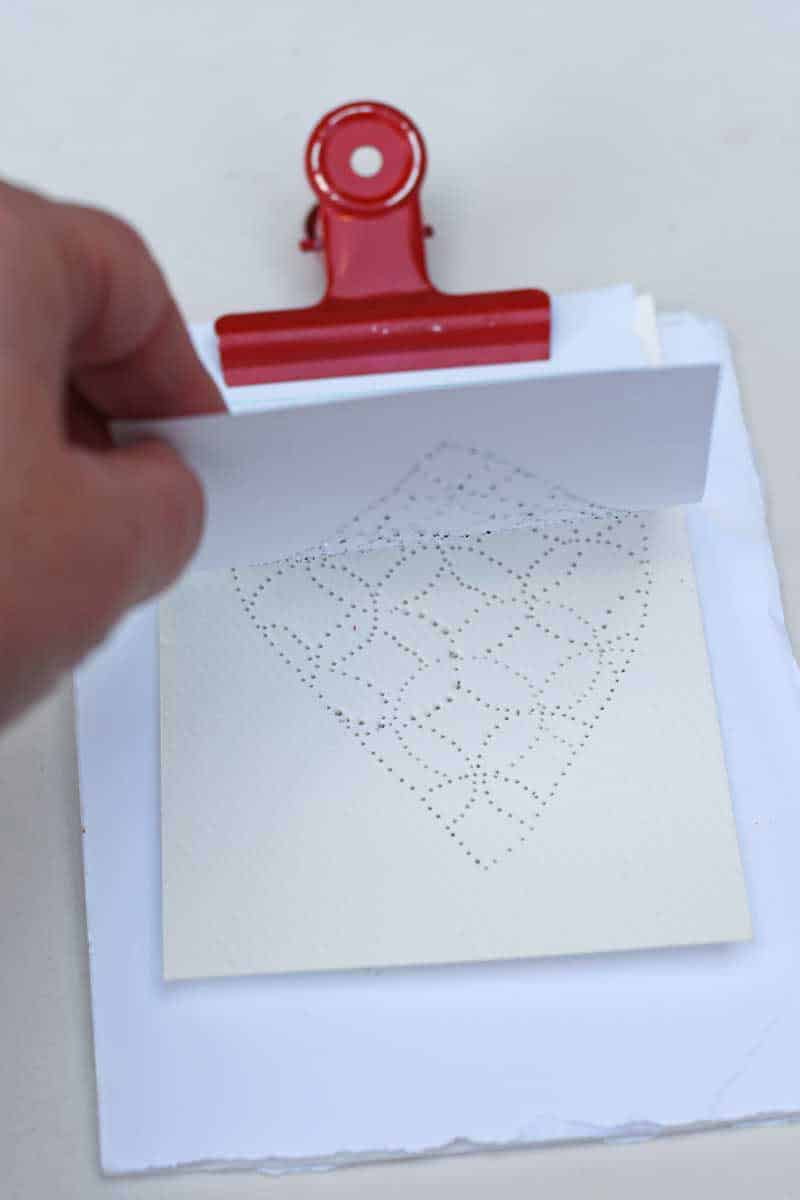 Showing the paper punched sashiko heart embroidery pattern
