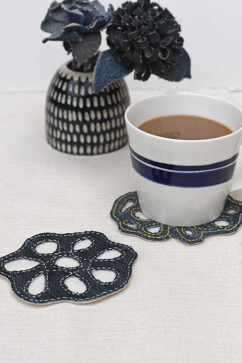 two denim coasters with cup of coffee and denim flowers