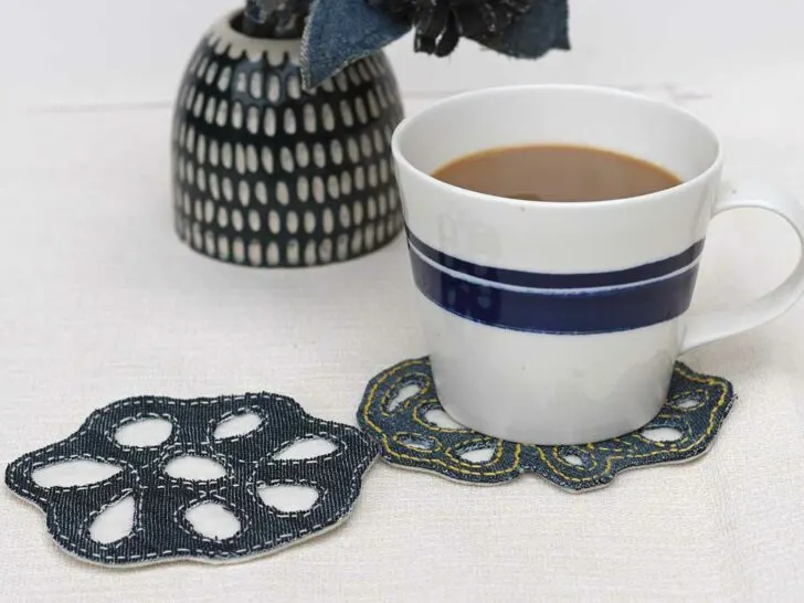 Two denim coasters hand stitched with cup of coffee feature