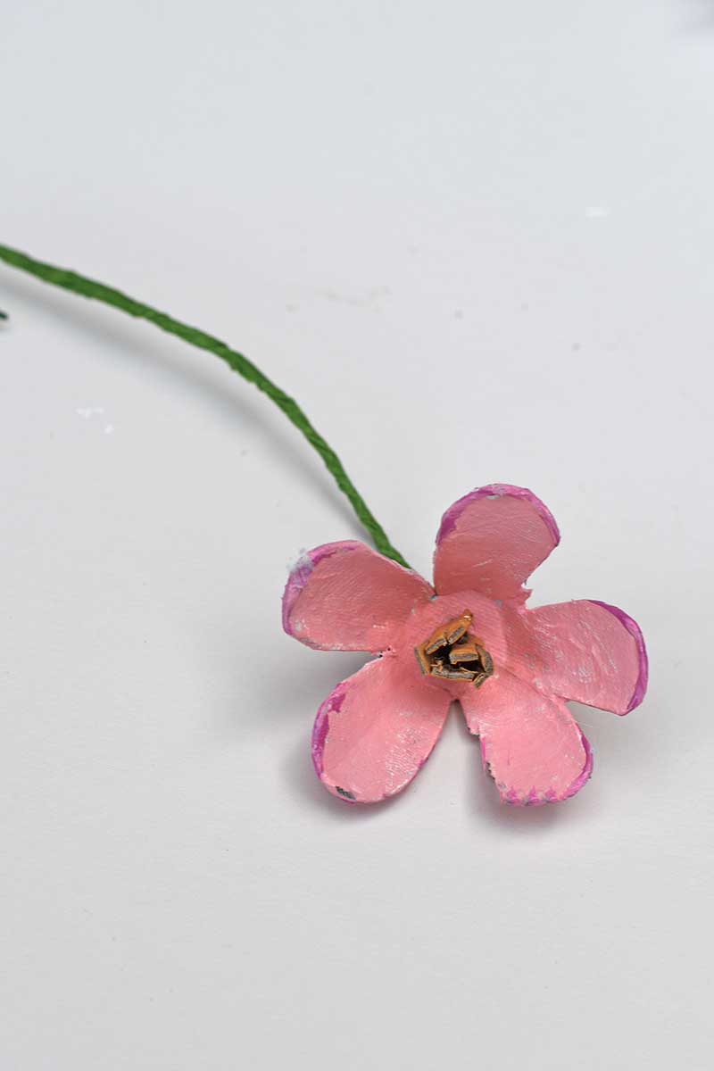 Painted pink cherry blossom egg carton flower