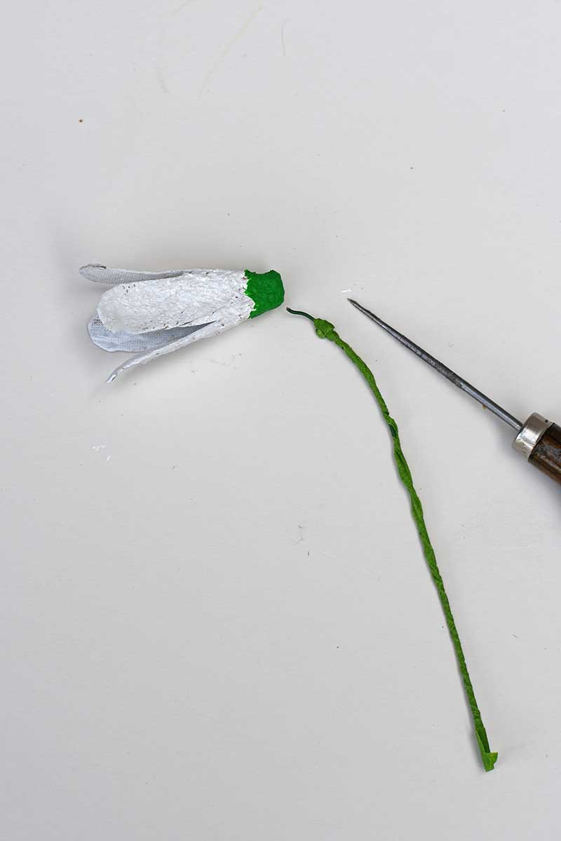 Snowdrop egg carton flower adding stem
