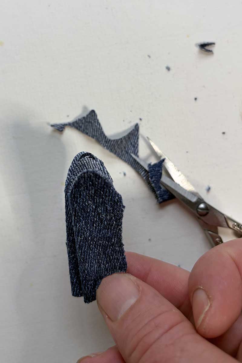 cutting the denim petals for denim bluebell flowers