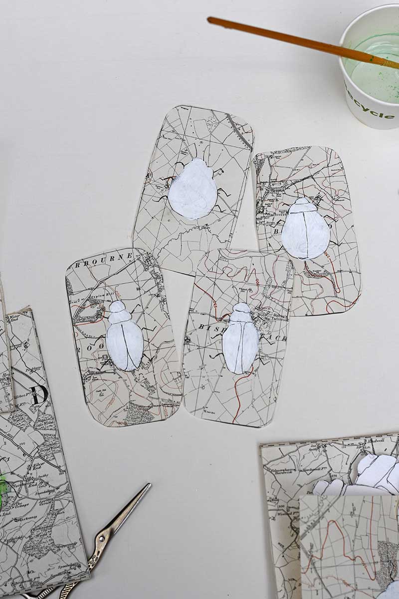 Painting the beetle shapes white