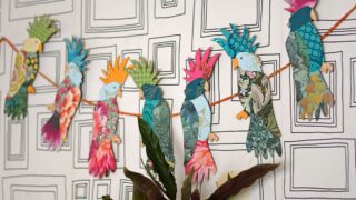 tropical bird cockatoo upcycled paper wall garland feature image