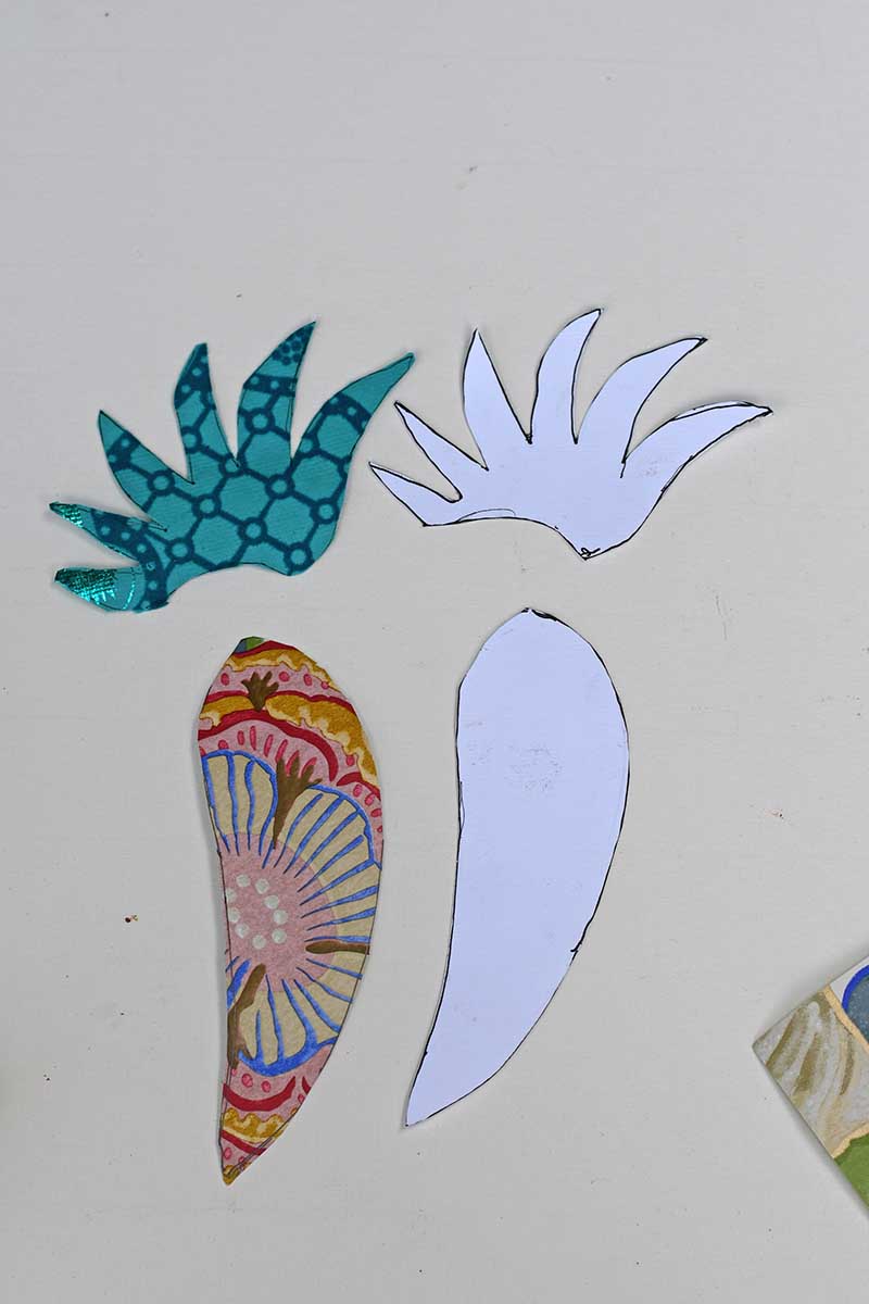 cutting out paper bird craft pieces