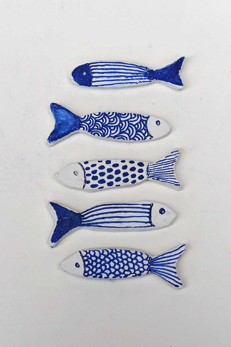 all finished painted clay fish blue and white patterns