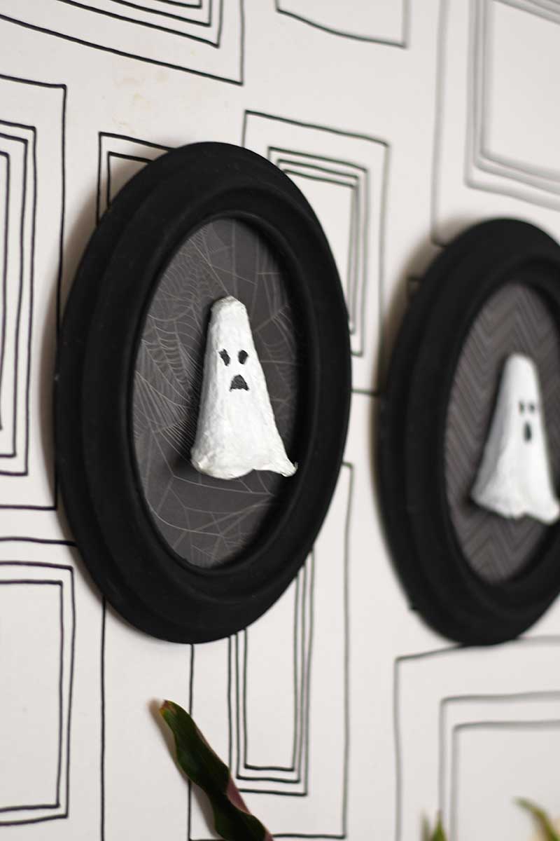 both ghosts hanging on wall