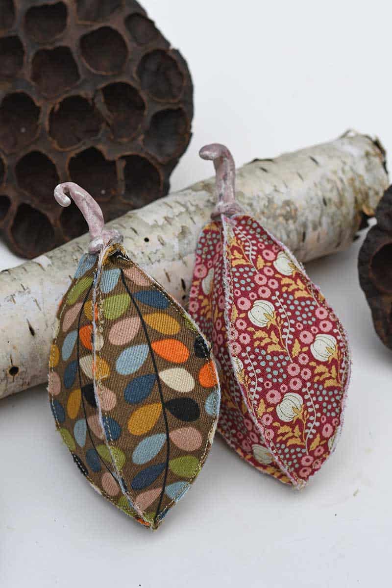 two fabric seed pods patterned fabric