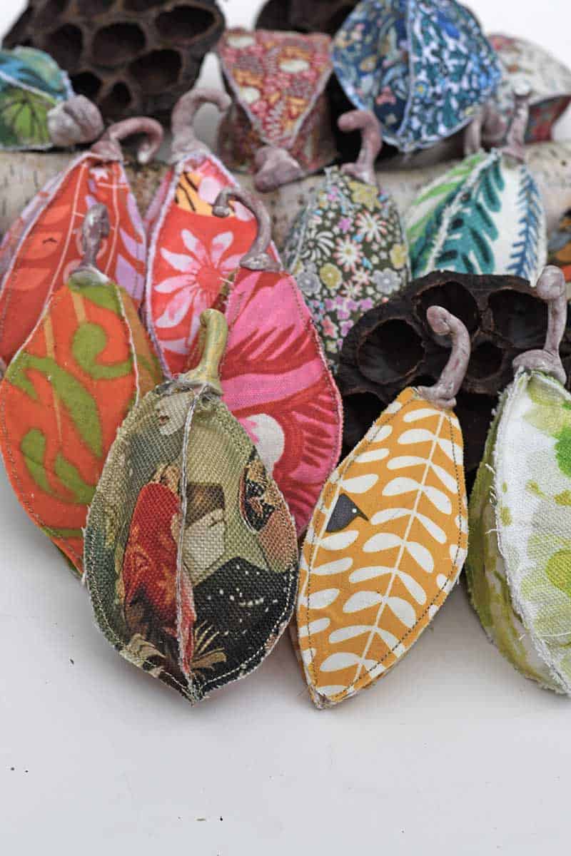 big pile of hand sewn scented fabric seed pods