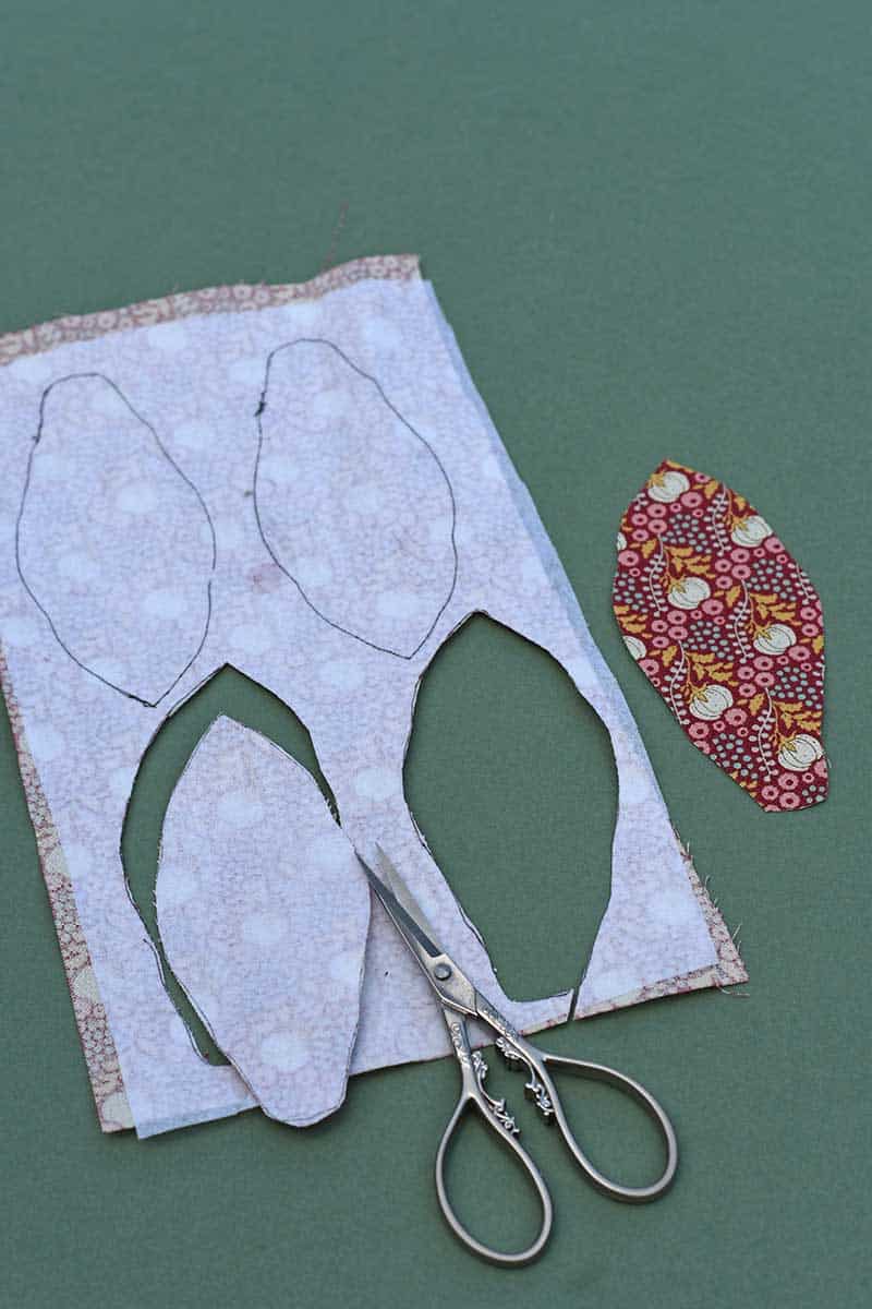 cutting out the patterned fabric pieces