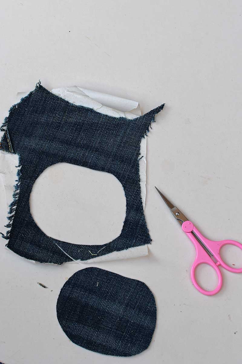cutting out denim shapes