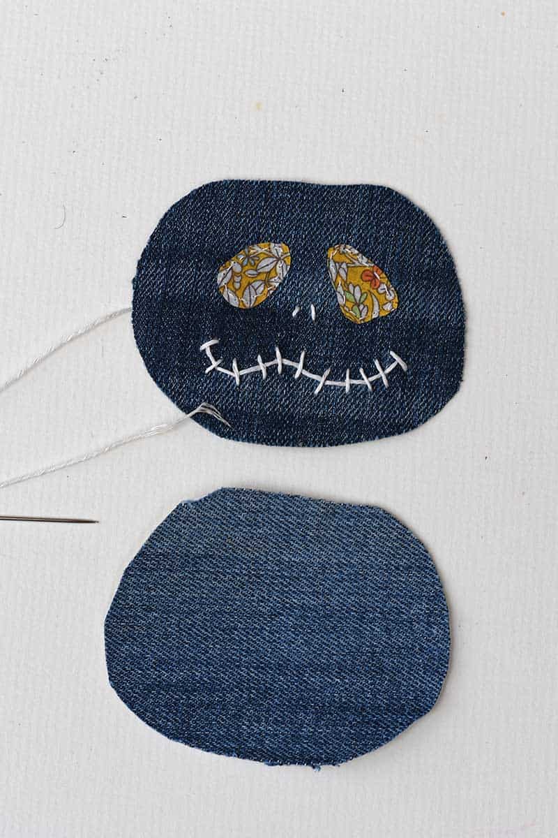 Sewing the pumpkin face