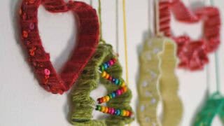 Yarn wrapped Christmas cookie cutters hanging decoration